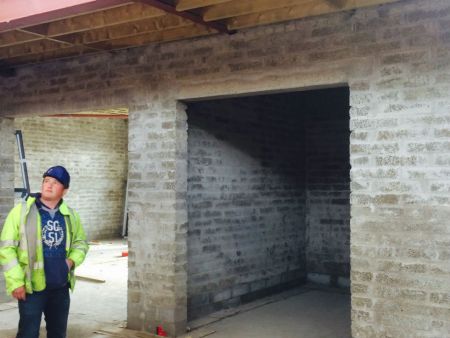 The walls go up
